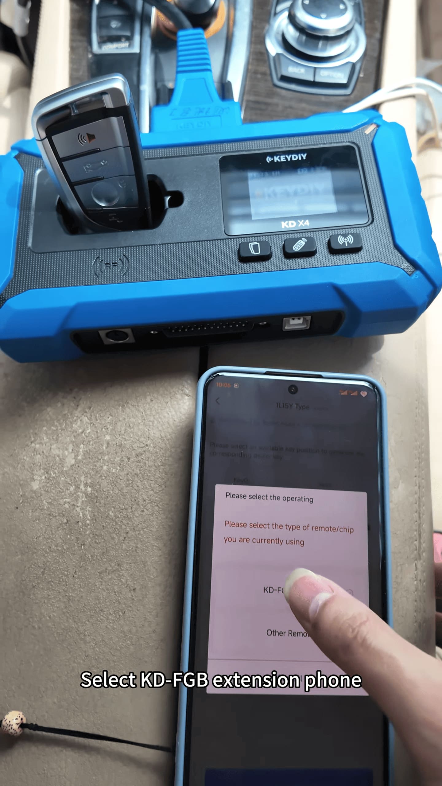 Place the new key on KD-X4 sensing coil